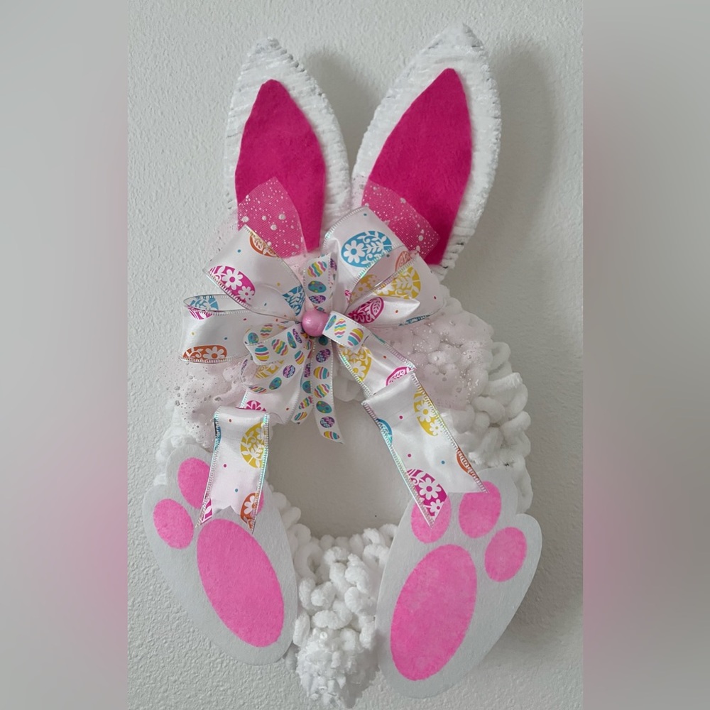 White fluffy yarn bunny wreath with cute bow.  Finished size 18” tall 10” wide.